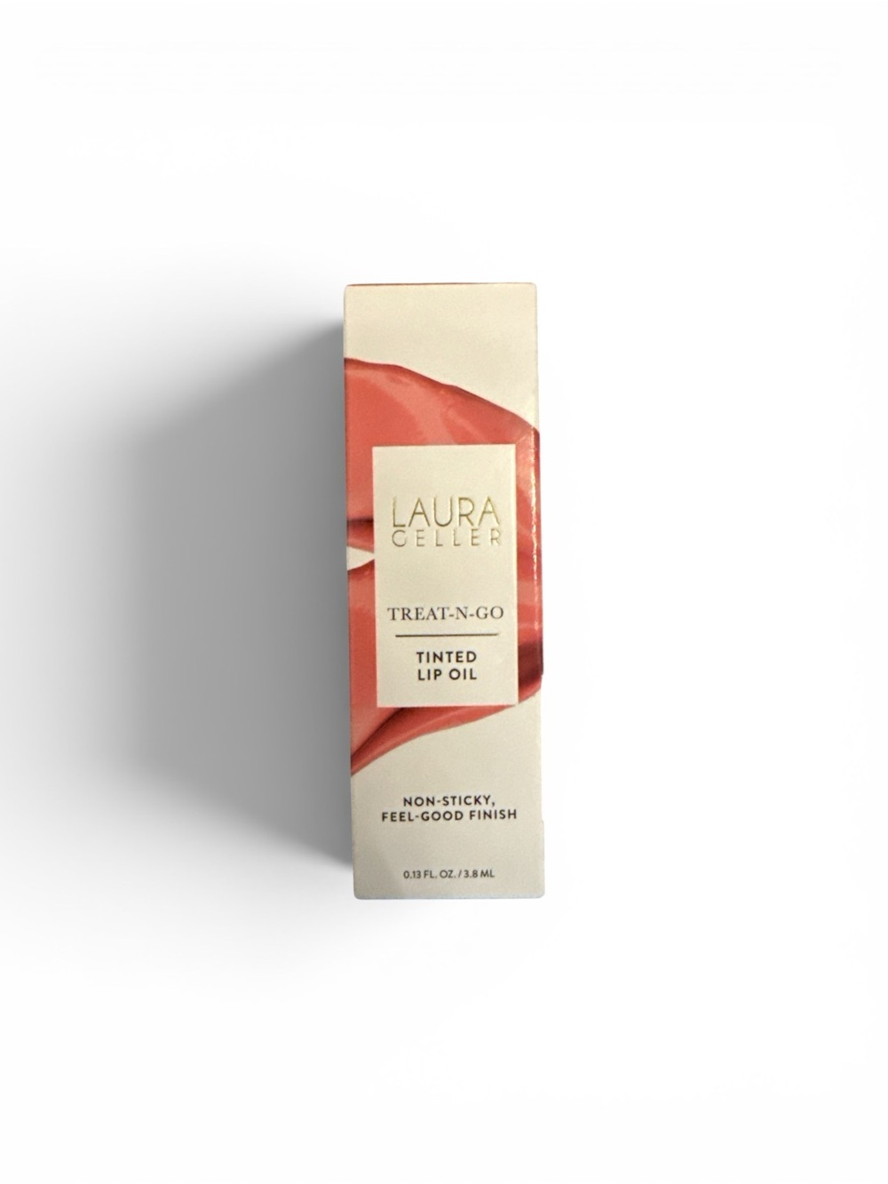 Laura Geller Treat-N-Go Tinted Lip Oil in Championship Pinky Peach